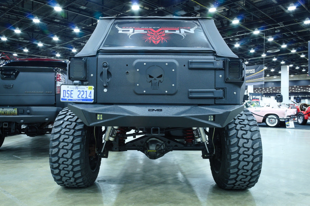 Devon Built custom lifted Jeep Wrangler at a car show