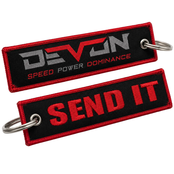 Devon Built Send It keychain with bold slogan graphic, front view